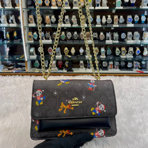 Coach disney edition crossbody sling bag black body