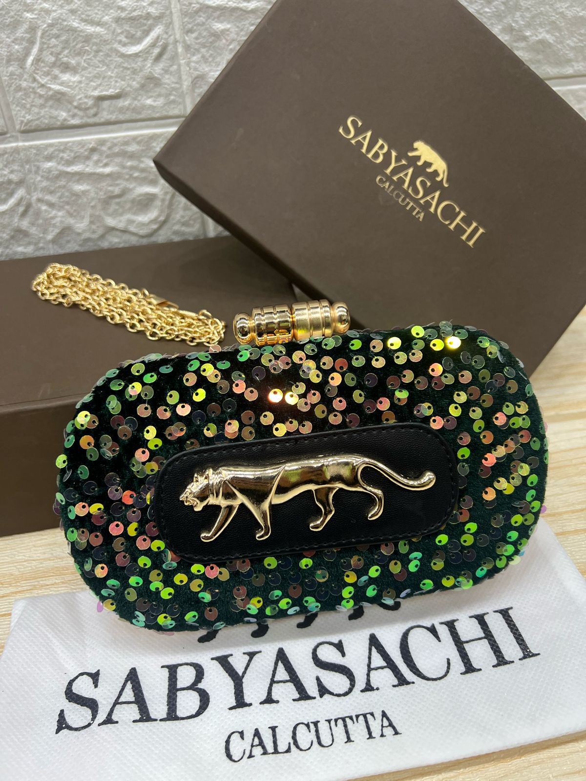 Sabyasachi Emerald Panther Sequin Clutch – Luxe Evening Edition