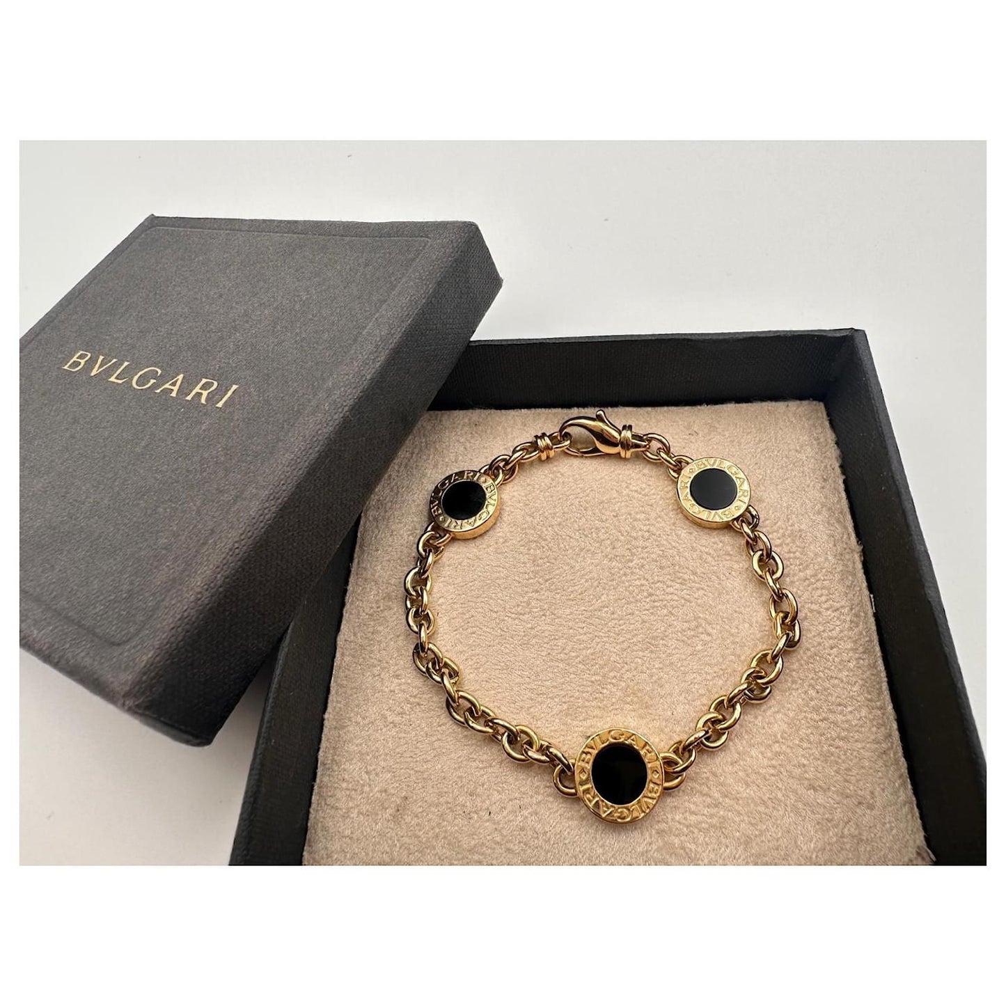 BVLGARI Iconic Disc Charm Bracelet – Black & Gold Edition