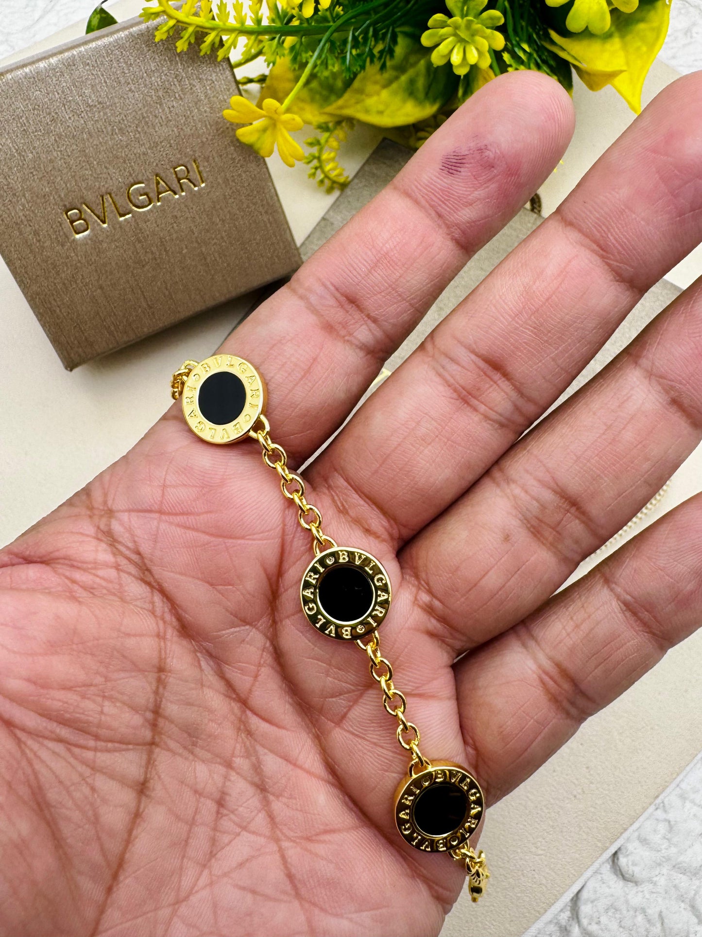 BVLGARI Iconic Disc Charm Bracelet – Black & Gold Edition