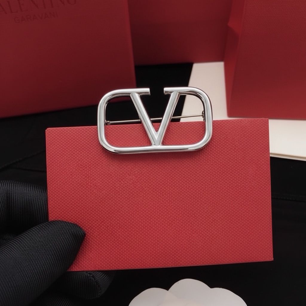 VALENTINO SIGNATURE BROOCH
