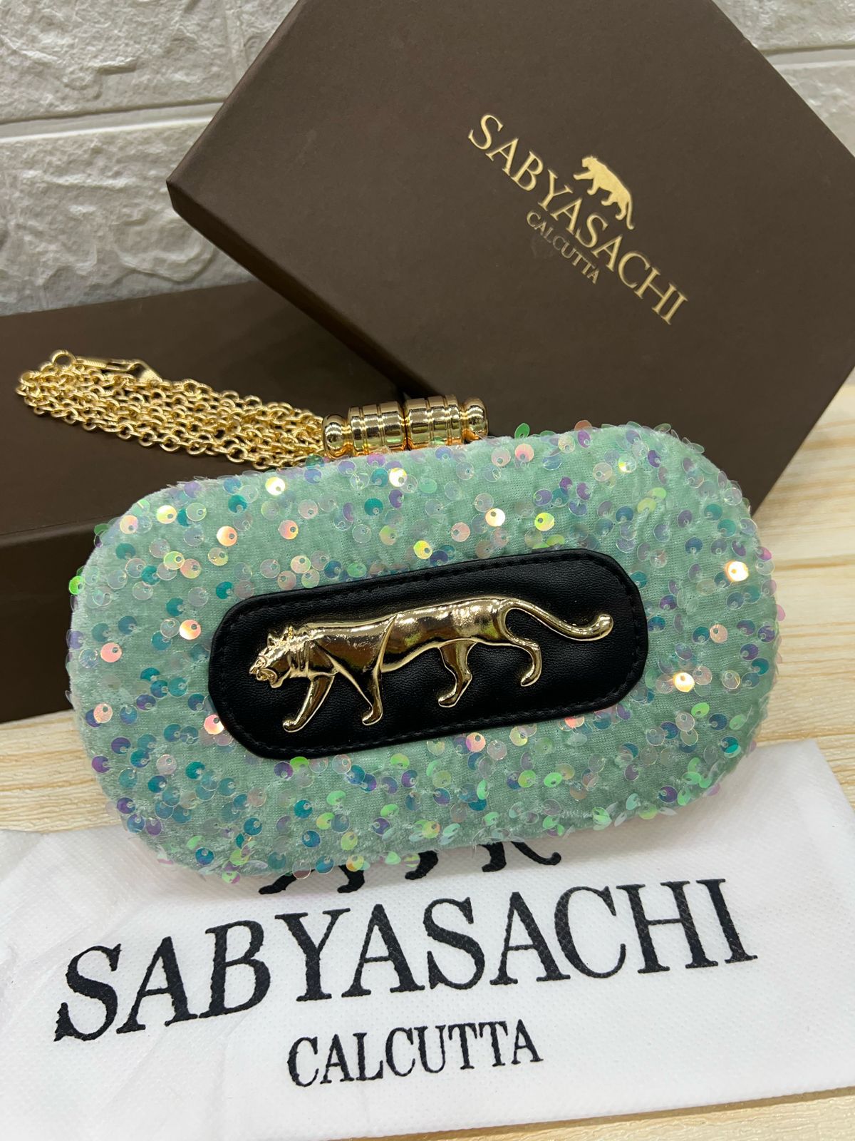 Sabyasachi Emerald Panther Sequin Clutch – Luxe Evening Edition