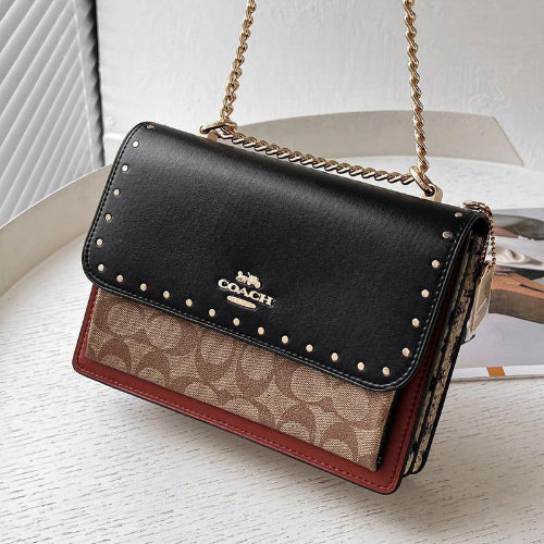 Klare Crossbody Bag In Signature Canvas With Rivets