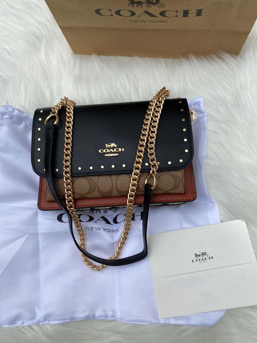 Klare Crossbody Bag In Signature Canvas With Rivets