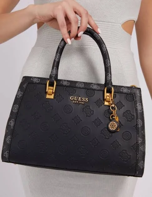 4D1450EC-200D-4BEF-8687-950097B9304A.jpg Guess sling bag for girls in black print