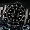 Rolex Submariner watch with black dial