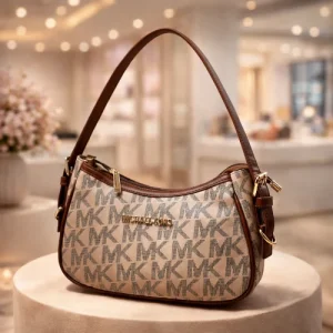 ChatGPTImageFeb13_2026_12_33_15PM.png Michael Kors Small Shoulder Bag in half-moon design