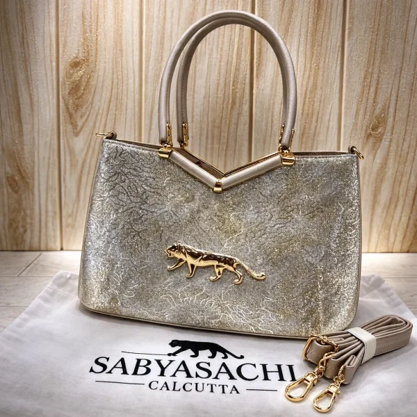 Sabyasachi Metallic Tiger Emblem Handbag front view