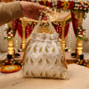 ChatGPTImageMar7_2026_03_07_00PM.png Luxory Royal Pearl Embroidered Potli Bag