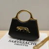 Sabyasachi Leopard Luxe Clutch front view