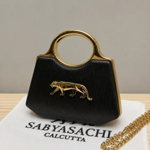 ChatGPTImageMay15_2026_03_19_44PM.png Sabyasachi Leopard Luxe Clutch front view