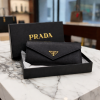 ChatGPT_Image_Mar_11_2026_01_41_29_PM.png PRADA THREE FOLD WALLET ( WITH DETACHABLE CARD HOLDER )