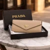 ChatGPT_Image_Mar_11_2026_01_43_13_PM.png PRADA THREE FOLD WALLET in black leather