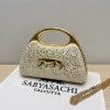 ChatGPT_Image_May_15_2026_03_08_54_PM.png Sabyasachi Elegant Leopard Clutch Bag front view
