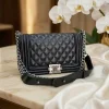 Chanel Le Boy Luxury Bag in black leather