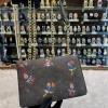 NI2lLXJV.jpg Coach Disney Edition Crossbody Sling Bag - Black Body Front View