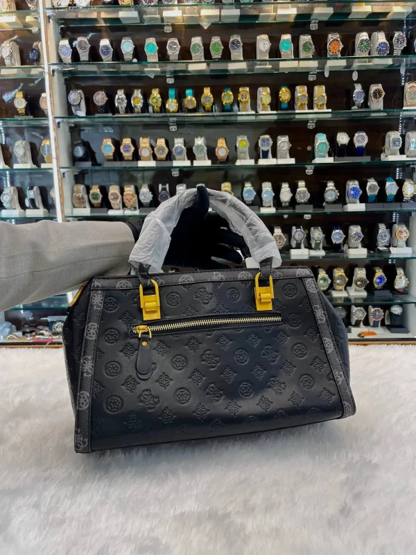 SaaDn3XT.jpg Guess sling bag for girls in black print