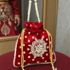 Untitleddesign-2025-12-15T171502.770.png Luxory Pearl Grace Embroidered Potli Bag front view
