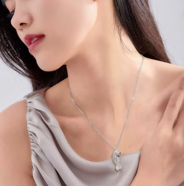 CARTIER beautiful necklace and earring set displayed elegantly