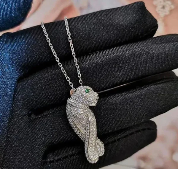CARTIER beautiful necklace and earring set displayed elegantly