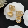 WhatsAppImage2026-01-27at6.41.20PM_1.jpg Dolce & Gabbana D&G Logo Diamond & Pearl Earrings close-up