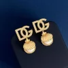 WhatsAppImage2026-01-27at6.41.21PM.jpg Dolce & Gabbana D&G Logo Diamond & Pearl Earrings close-up