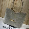 Sabyasachi Metallic Tiger Emblem Handbag front view