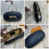 WhatsAppImage2026-02-17at11.03.22AM_1.jpg Sabyasachi Noir Panther Royale Clutch front view