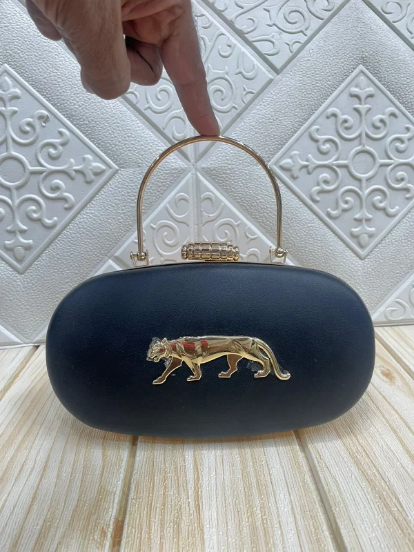 WhatsAppImage2026-02-17at11.03.30AM.jpg Sabyasachi Noir Panther Royale Clutch front view