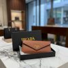 WhatsAppImage2026-03-08at5.53.53PM.jpg PRADA THREE FOLD WALLET ( WITH DETACHABLE CARD HOLDER )