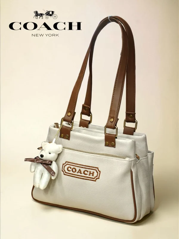 Coach New York Canvas Tote Bag in beige with teddy keychain