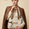 Coach New York Canvas Tote Bag in beige with teddy keychain