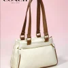 Coach New York Canvas Tote Bag in beige with teddy keychain