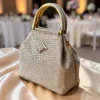 WhatsAppImage2026-03-15at1.37.01PM.jpg Luxury Croco Textured Potli Bag with Gold Handle - Front View