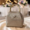 WhatsAppImage2026-03-15at1.37.02PM.jpg Luxury Croco Textured Potli Bag with Gold Handle - Front View