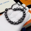 LV Monogram Beaded Bracelet close-up view