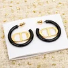 Christian Dior CD Black Hoop Earrings front view