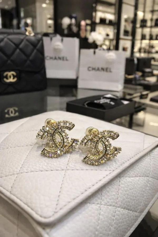 WhatsAppImage2026-04-10at9.59.42AM.jpg Chanel Crystal Double C Stud Earrings front view