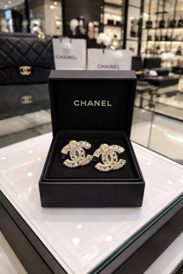 WhatsAppImage2026-04-10at9.59.43AM.jpg Chanel Crystal Double C Stud Earrings front view