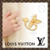 WhatsAppImage2026-04-13at3.54.06PM.jpg Elegant LV Gold Flower Ring displayed on a velvet background
