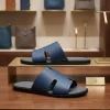 HERMES slip ons for men in black leather