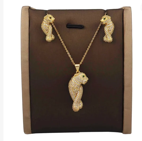 CARTIER beautiful necklace and earring set displayed elegantly