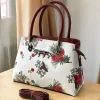 WhatsApp_Image_2026-01-27_at_11.10.02_PM.jpg Sabyasachi Floral Printed Leather Sling Handbag front view