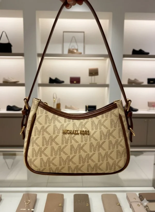 WhatsApp_Image_2026-02-07_at_2.52.15_PM_2.jpg Michael Kors Small Shoulder Bag in half-moon design