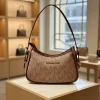 WhatsApp_Image_2026-02-07_at_2.52.16_PM.jpg Michael Kors Small Shoulder Bag in half-moon design