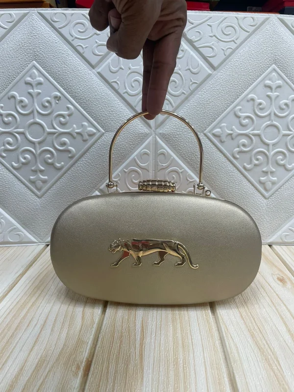 WhatsApp_Image_2026-02-17_at_11.03.17_AM_1.jpg Sabyasachi Noir Panther Royale Clutch front view