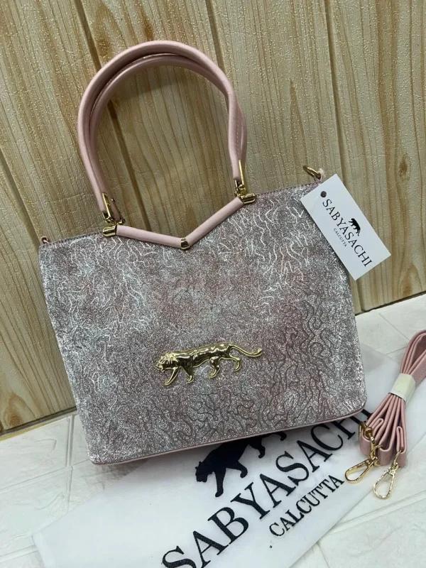 Sabyasachi Metallic Tiger Emblem Handbag front view