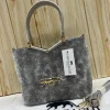 Sabyasachi Metallic Tiger Emblem Handbag front view