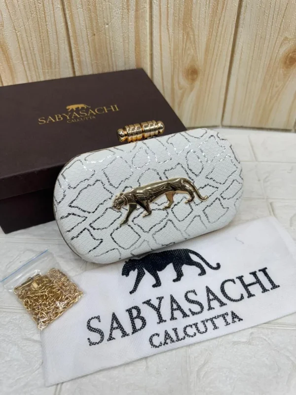 WhatsApp_Image_2026-02-17_at_11.03.24_AM.jpg Sabyasachi Heritage Panther Clutch in Regal Sand Edition