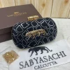 WhatsApp_Image_2026-02-17_at_11.03.26_AM.jpg Sabyasachi Heritage Panther Clutch in Regal Sand Edition